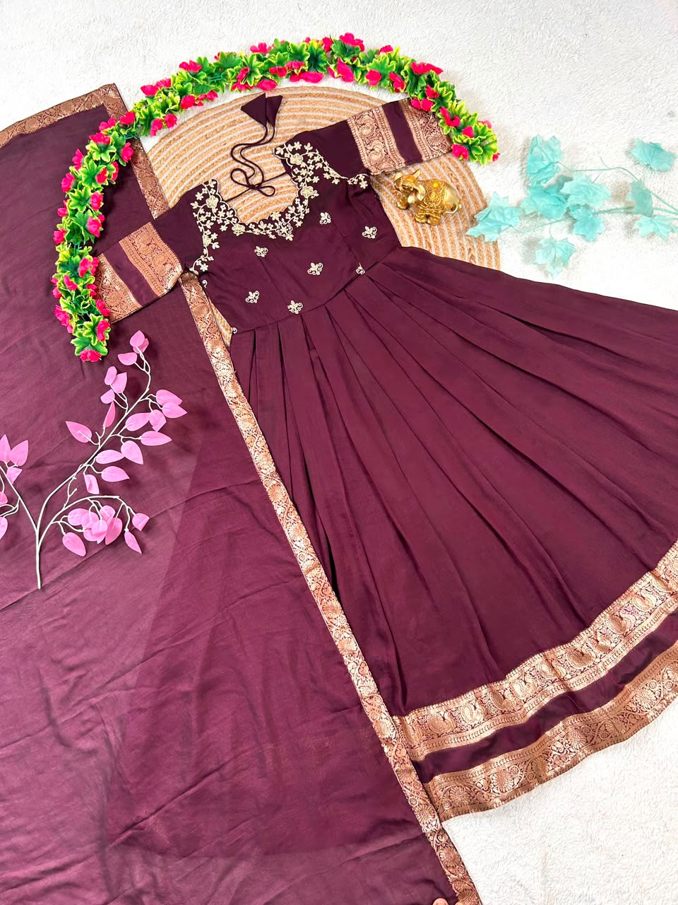 South Indian function in timeless elegance with this beautifully crafted Royal Wine Gown(G01)