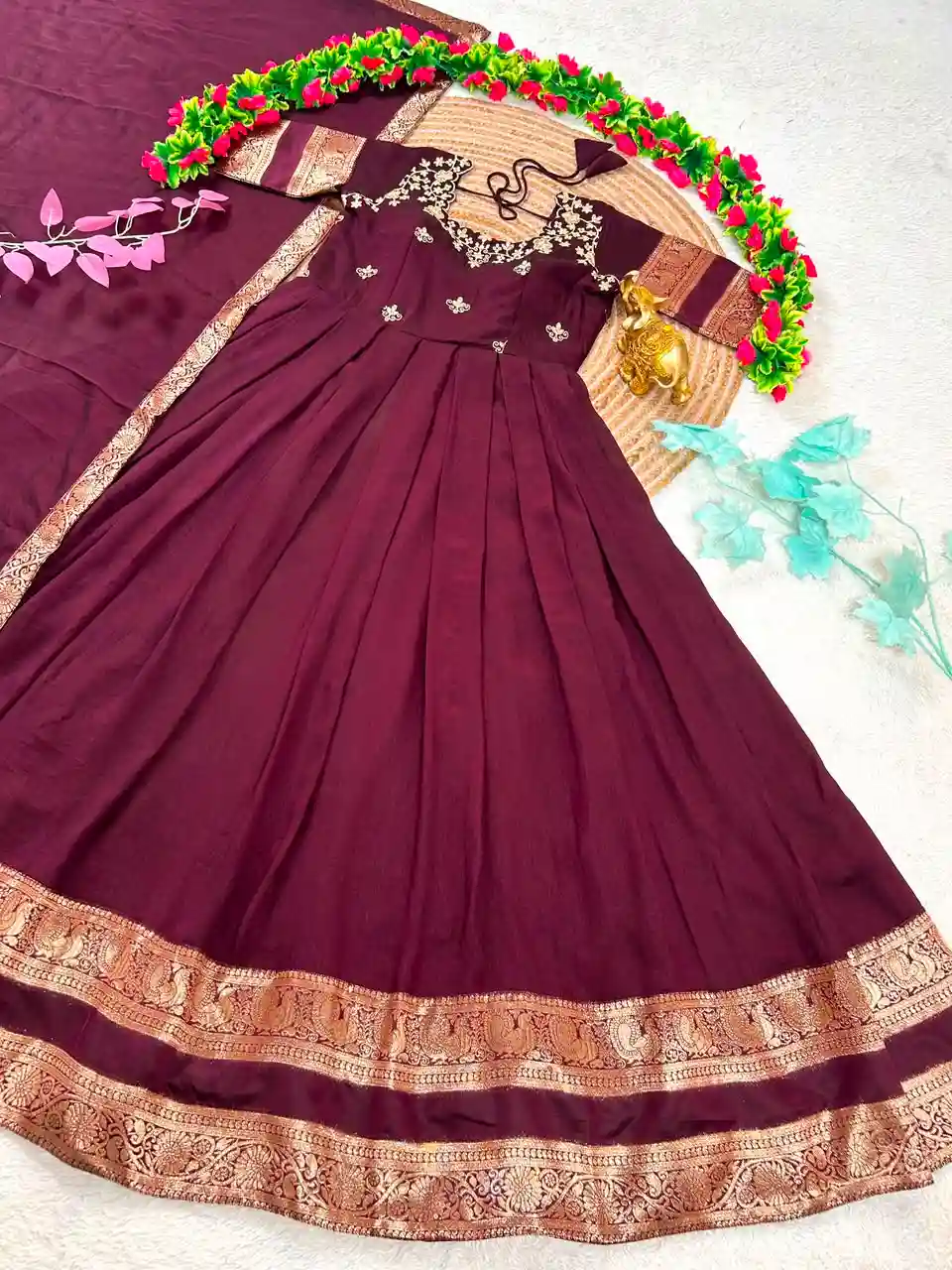 South Indian function in timeless elegance with this beautifully crafted Royal Wine Gown(G01)