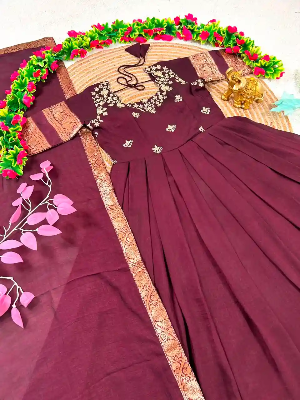 South Indian function in timeless elegance with this beautifully crafted Royal Wine Gown(G01)