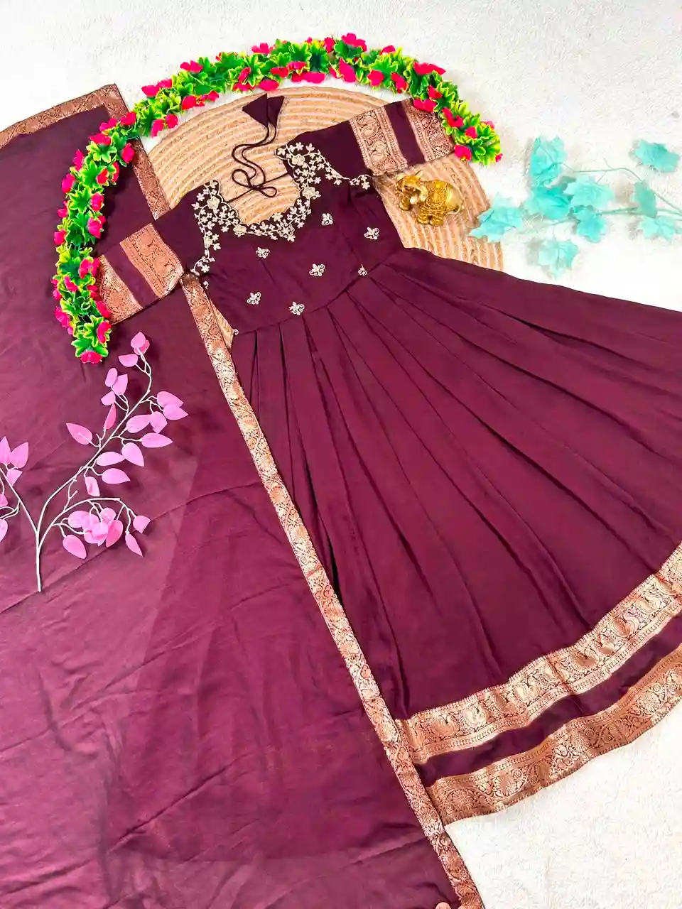 South Indian function in timeless elegance with this beautifully crafted Royal Wine Gown(G01)