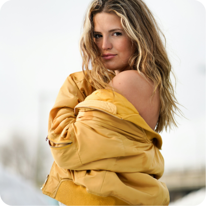 woman yellow bomber jacket portrait